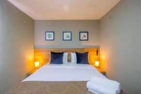 Fully Furnished with Comfortable 1BR Apartment at Mustika Golf Residence By Travelio